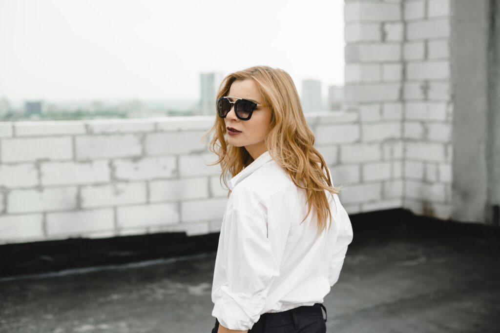 Woman in white button-down shirt