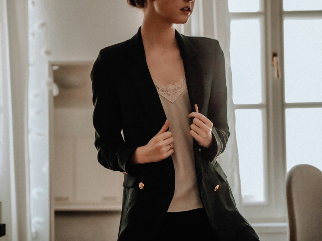 Woman in blazer and silk camisole