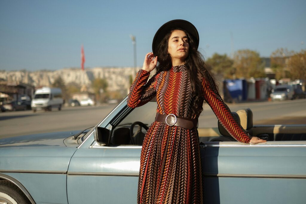 Young woman in fashionable midi dress